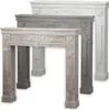 Three fireplace mantels of varying sizes and colors are displayed side-by-side against a white background. Anteprima dell’immagine prodotto