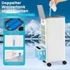A person is pouring water into an air cooler, with a snowy mountain landscape in the background. Náhľad obrázku produktu