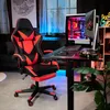 A gaming chair and desk setup in a room with ambient lighting. Náhled obrázku produktu
