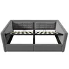 A grey upholstered bed frame with a slatted mattress base is shown against a white background. Voir les images du produit