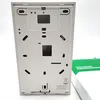 The back of a white electronic device, likely a call button module, is shown against a white and light gray background. A green box with text is partially visible on the right. Podgląd zdjęcia produktu
