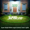 A house facade with a lawn in front, illuminated by solar lights. Náhled obrázku produktu