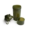 A disassembled green shaker bottle on a white background. Voir les images du produit
