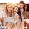 A group of friends taking a selfie on a beach. Produktbild-Vorschau