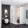 A modern bathroom with a toilet, shower cabin, and a towel rack. Produktbild-Vorschau