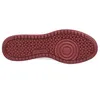 The sole of a white and red sneaker is shown against a white background. Anteprima dell’immagine prodotto