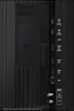 Close-up view of the ports and connectors on the back of a television. Produktbild-Vorschau