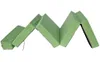 A folded green mattress on a white background. Náhled obrázku produktu