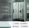 A modern shower enclosure with black frame and glass doors, showcasing its features. Produktbild-Vorschau
