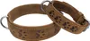 Two brown leather dog collars with paw print patterns are shown against a white background. Produktbild-Vorschau