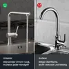 A split image comparing two kitchen faucets. The left side shows a faucet with water running, labeled 'Unseres:' with positive features. The right side shows a different faucet with a red sad face icon, labeled 'Andere:' with negative features. Produktbild-Vorschau