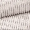 A close-up view of beige corduroy fabric, showing the texture and ribbed pattern. Náhled obrázku produktu