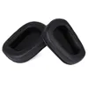 Two black ear pads for headphones are shown against a white background. Produktbild-Vorschau
