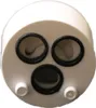A close-up view of a white plumbing cartridge with three black O-rings and two small white plastic protrusions. Produktbild-Vorschau