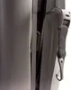 A close-up view of a car seat's safety belt mechanism and strap. Produktbild-Vorschau