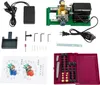 A collection of items related to a bead drilling machine, including the machine itself, accessories, and instructions. Podgląd zdjęcia produktu