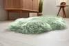 Schaffell aus echtem Lammfell, salbeifarben, im Schlafzimmer ausgelegt
 Produktbild-Vorschau