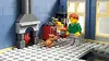 A Lego scene depicting a person and a cat in a room with a fireplace and windows. Náhled obrázku produktu