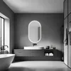 A modern, minimalist bathroom with a freestanding bathtub, vanity with a sink and mirror, and a tall cabinet. Anteprima dell’immagine prodotto