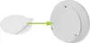 An adhesive pad is being peeled off from a round white object, with a green arrow indicating the direction of attachment. Voir les images du produit