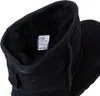 Close-up view of the inside of a black boot, showing a size label. Anteprima dell’immagine prodotto