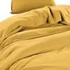 A close-up view of yellow mustard-colored bedding, showing the texture and folds of the fabric. Produktbild-Vorschau