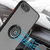 A close-up shot of a smartphone case with a ring holder, placed in a car's interior. Produktbild-Vorschau