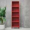 A tall, red metal bookshelf against a gray concrete wall, with a large potted plant to the left. Náhled obrázku produktu
