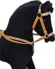 A close-up side view of a black plush rocking horse with brown leather-like straps and a saddle. Produktbild-Vorschau