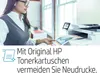 A woman is interacting with a printer, with text overlaying the bottom of the image. Podgląd zdjęcia produktu