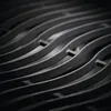 A close-up, abstract view of a grill grate. Produktbild-Vorschau