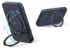 Two views of a black Baseus PicoGo Qi2 wireless charger with a ring stand, showing its rotational and tilting capabilities. Anteprima dell’immagine prodotto