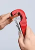 Hands using a red pipe cutter on a copper pipe. Produktbild-Vorschau