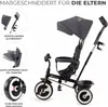 A black and gray Kinderkraft ASTON tricycle is shown against a white background, with inset images highlighting specific features. Produktbild-Vorschau