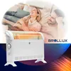 A couple is relaxing on a couch while a BROLLUX electric heater is in the foreground. Produktbild-Vorschau