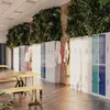 A modern locker room with a green wall and colorful lockers. Voir les images du produit