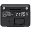 The back of a black TFA Dostmann clock is shown, with manufacturer information and regulatory marks. Anteprima dell’immagine prodotto