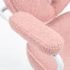 A close-up view of a pink teddy bear fleece office chair armrest. Podgląd zdjęcia produktu