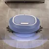 A blue robot vacuum cleaner is shown on a tiled floor, with a subtle blue light emanating from its base. Náhled obrázku produktu