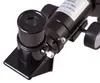A close-up view of a telescope's eyepiece and focusing mechanism. Produktbild-Vorschau