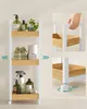 A multi-tiered shelving unit with various bathroom items. Náhled obrázku produktu