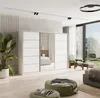 A modern bedroom with a large white wardrobe, a bed, and seating. Produktbild-Vorschau