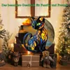 A stained glass cat figurine is displayed on a table with Christmas decorations, including trees and teddy bears. Produktbild-Vorschau