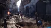 A group of zombies are walking down a street in a post-apocalyptic city. Produktbild-Vorschau