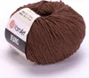 A ball of brown yarn with a label. Podgląd zdjęcia produktu