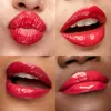A collage of four close-up images of different people's lips wearing red lipstick. Produktbild-Vorschau