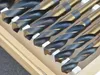 A set of drill bits in a wooden box. Voir les images du produit