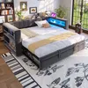 A modern living room with a sofa bed that has been converted into a bed. Podgląd zdjęcia produktu