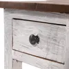 A close-up view of a drawer on a wooden table with a dark wooden top and a distressed white painted drawer front. Náhled obrázku produktu