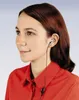 A woman wearing a red shirt and an earbud headset. Produktbild-Vorschau
